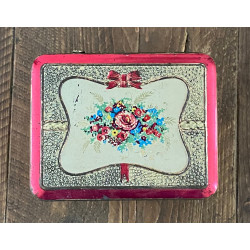 Vintage blik met bloemen